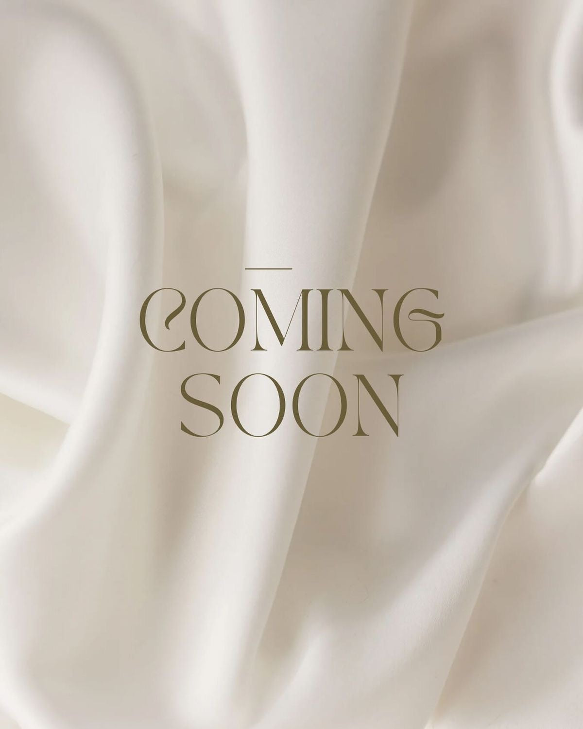 Delilah  | Off-White Satin Asymmetrical Tiered Strapless Dress